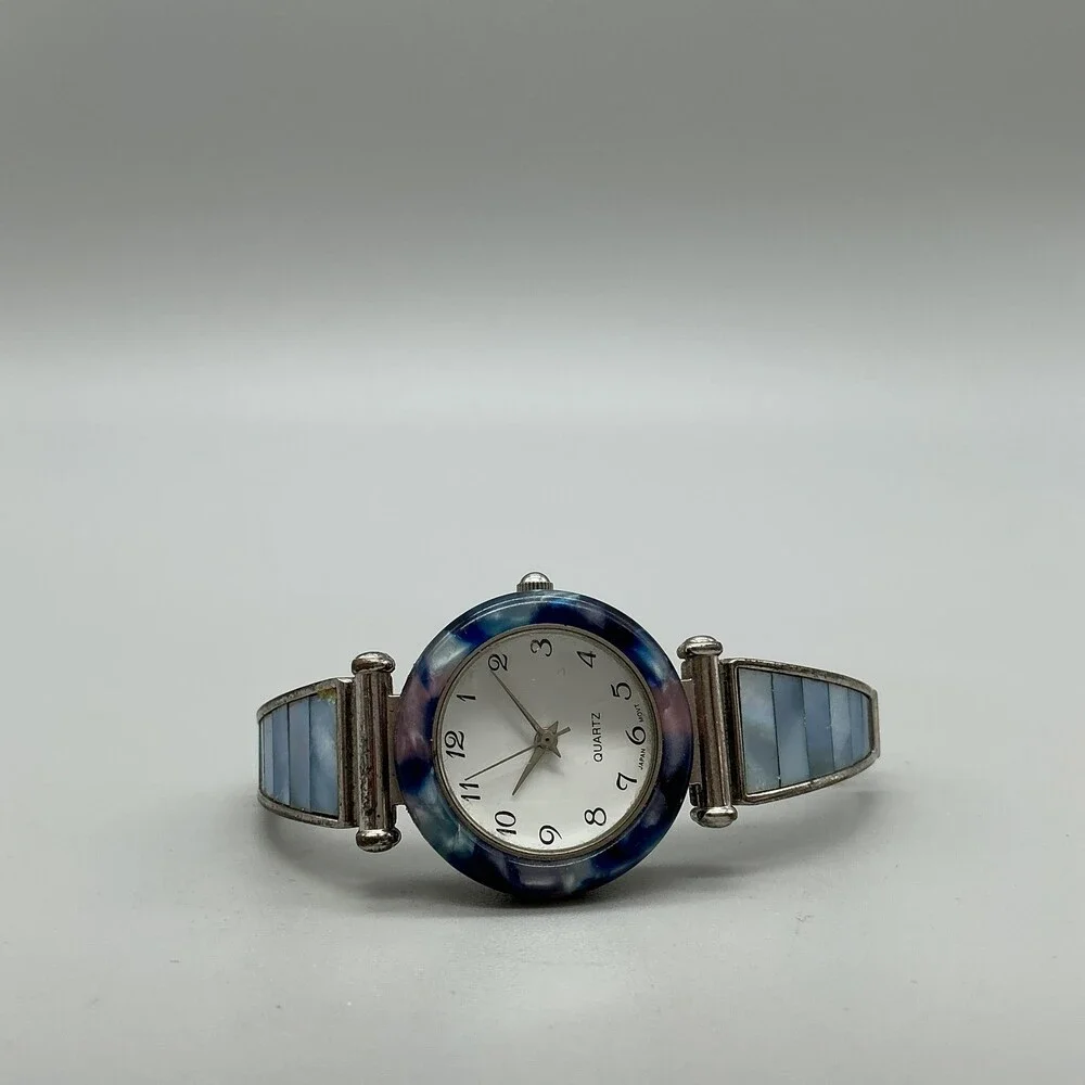 Avon F69038-1/P Women Watch 27mm Silver Tone Blue Bezel Stretch Band New Battery